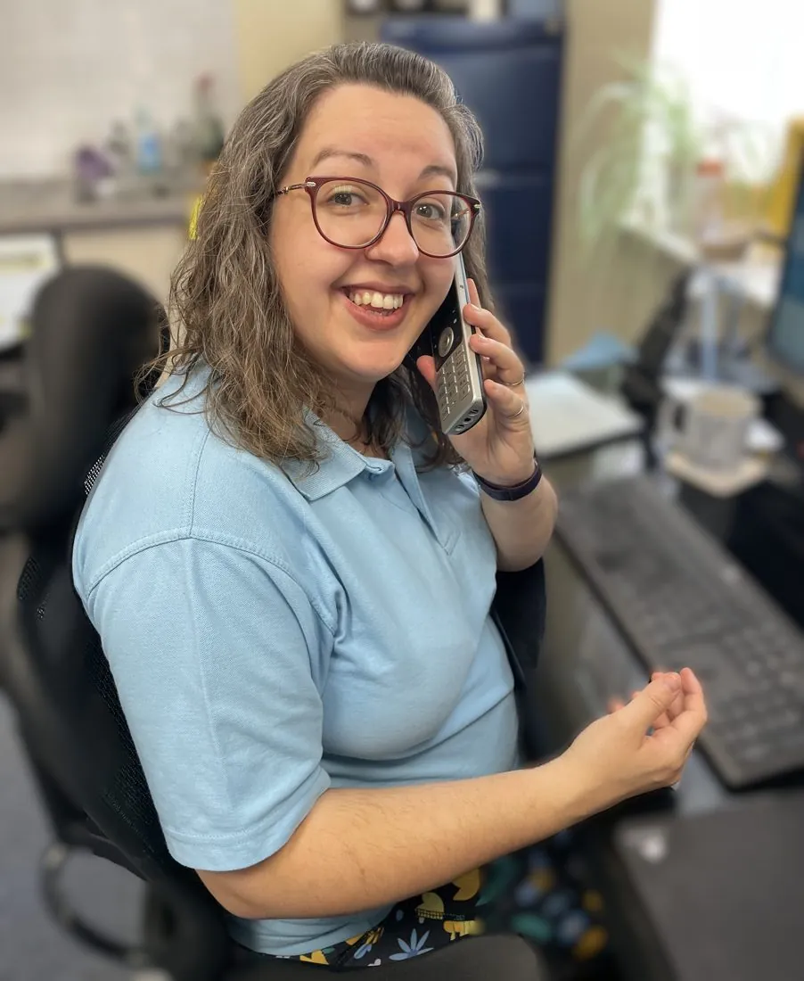 Speech Stuff team member answering the phone