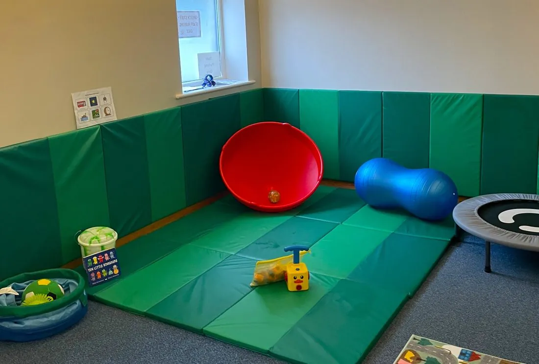 Sensory room at The Hive with mats and play equipment
